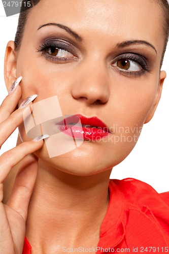 Image of beautiful young woman with perfect skin and red lips makeup