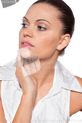 Image of beautiful young woman with perfect skin and soft makeup 