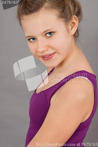 Image of young teenager girl smiling having fun