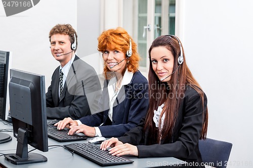 Image of smiling callcenter agent with headset support