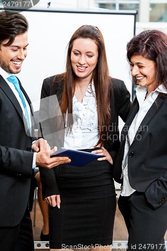 Image of business people working in office teamwork 