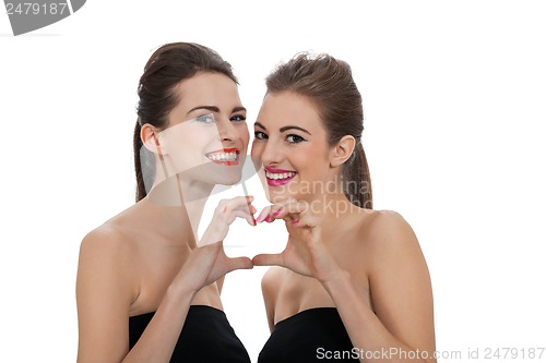 Image of two beautiful girls with colorful makeup isolated
