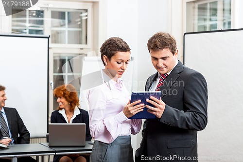 Image of business people working in office teamwork 