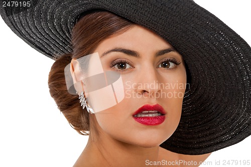 Image of glamour woman with black hat and red lips