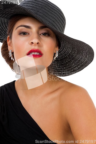 Image of glamour woman with black hat and red lips
