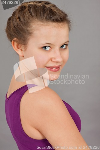 Image of young teenager girl smiling having fun