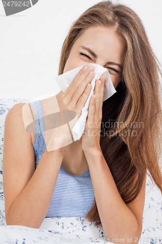 Image of young brunette woman with flu cold influenza 