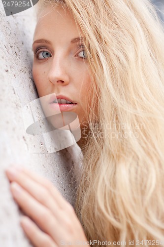 Image of happy young blonde woman with hat outdoor summertime