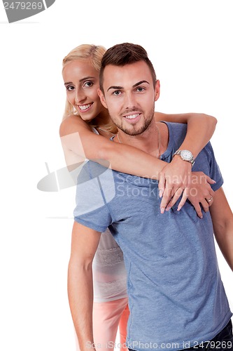 Image of young attractive couple in love embracing portrait