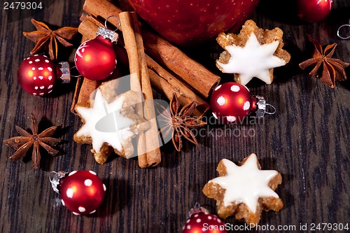 Image of fresh tasty christmas cinnamon cookies and sticks decoration 