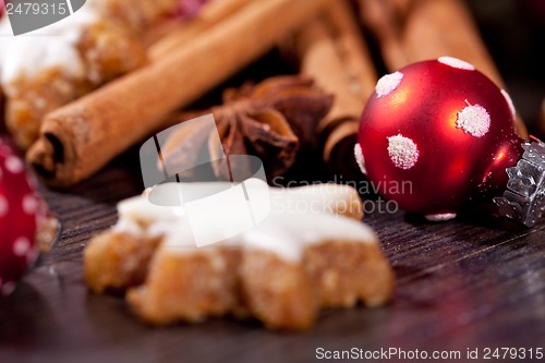 Image of fresh tasty christmas cinnamon cookies and sticks decoration 