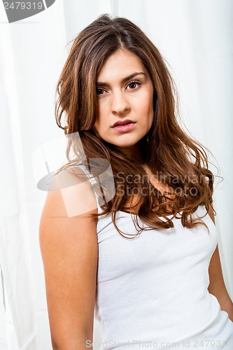 Image of beautiful young woman with perfect skin and soft makeup 