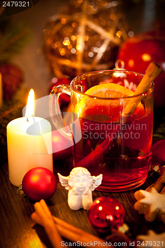 Image of hot tasty spicy mulled red wine with orange and cinnamon christmas 