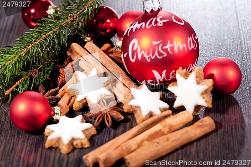 Image of fresh tasty christmas cinnamon cookies and sticks decoration 