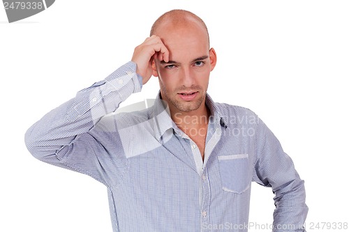 Image of young adult businessman frustrated stressed headache isolated