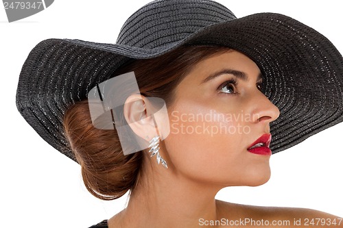 Image of glamour woman with black hat and red lips