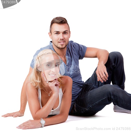 Image of young attractive couple in love embracing portrait