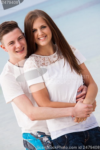 Image of attractive young couple in love having fun in summer holidays