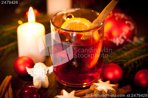 Image of hot tasty spicy mulled red wine with orange and cinnamon christmas 
