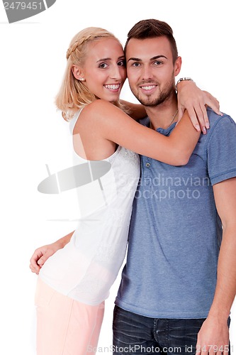 Image of young attractive couple in love embracing portrait