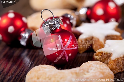 Image of fresh tasty christmas cinnamon cookies and sticks decoration 