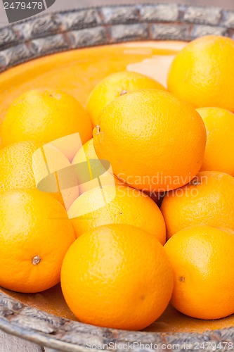 Image of fresh orange fruits decorative on table in summer