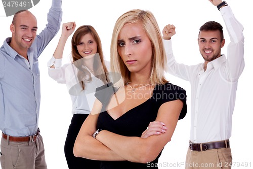 Image of young businesswoman bullying mobbing by team isolated 