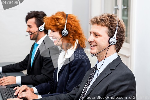 Image of smiling callcenter agent with headset support