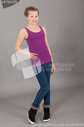 Image of young teenager girl smiling having fun