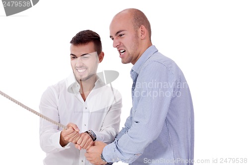 Image of business woman against businessman pulling rope isolated