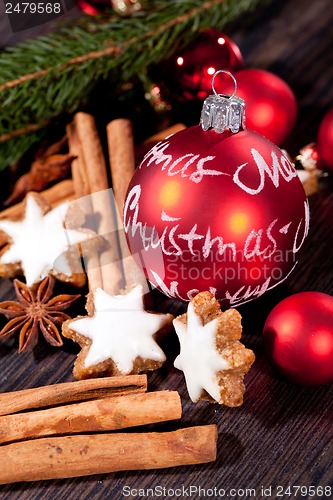 Image of fresh tasty christmas cinnamon cookies and sticks decoration 