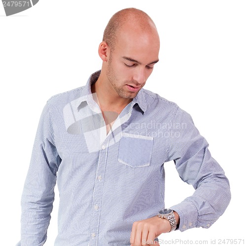 Image of young adult business man looking at watch portrait