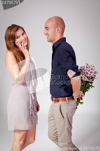 Image of young attractive couple in love embracing portrait