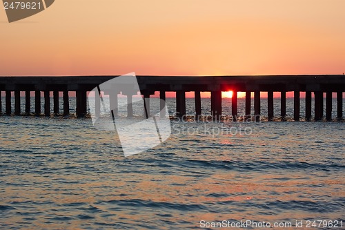 Image of Old sea pier at sunset