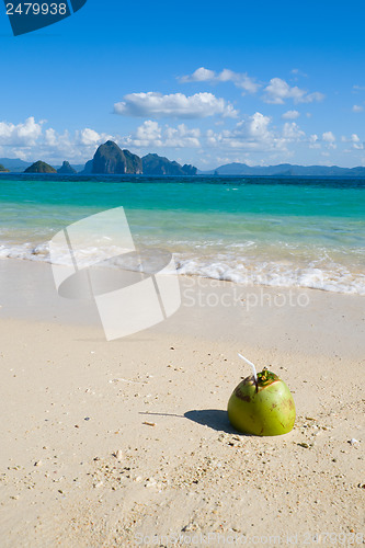 Image of Coconut drink on tropical beach