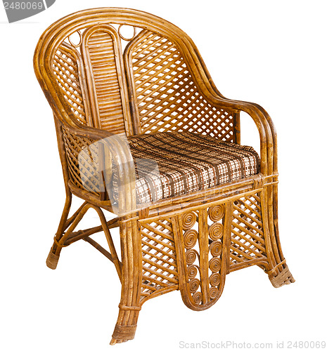 Image of Antique indian wooden wicker armchair isolated on white