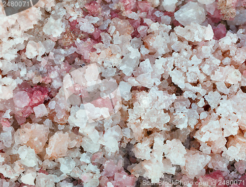 Image of Natural salt with pink crystals close-up