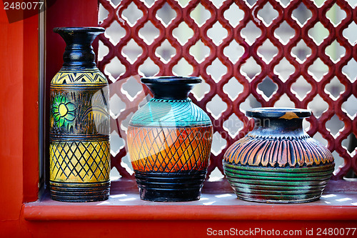 Image of Vintage vases on the windowsill. India