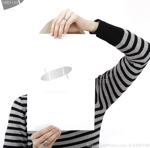 Image of Hand holdong a paper.