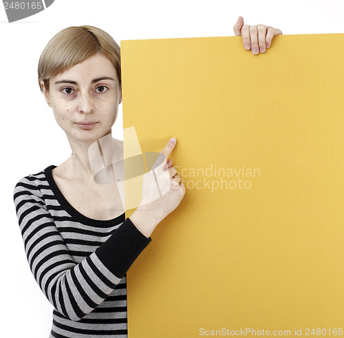 Image of Woman holding a paper