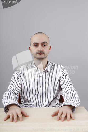 Image of Man at desk