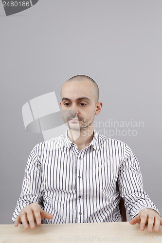 Image of Man at desk