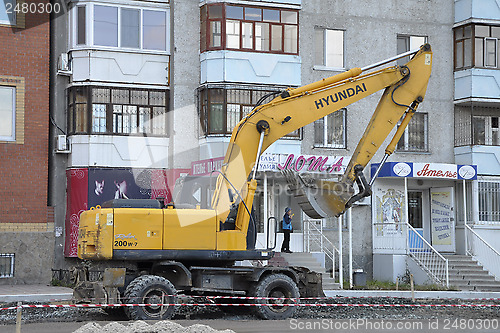 Image of The special equipment on a construction of roads. Excavator