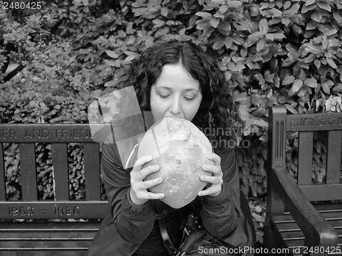 Image of Girl eating bread