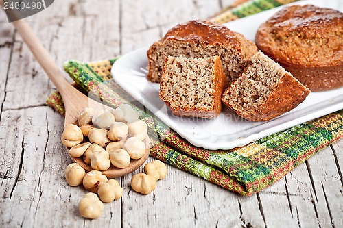 Image of sliced fresh buns hazelnuts in spoon