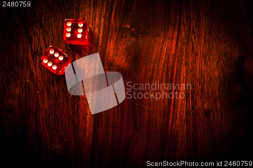 Image of Red dice on a table