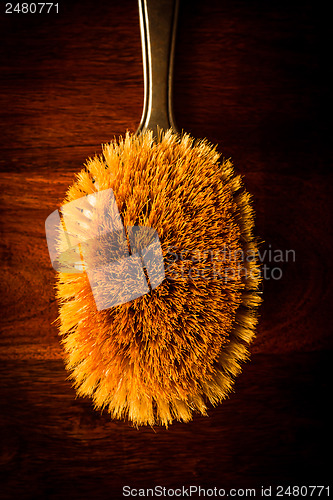 Image of Hairbrush on wood