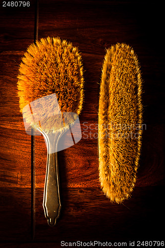 Image of Hairbrushes on wood