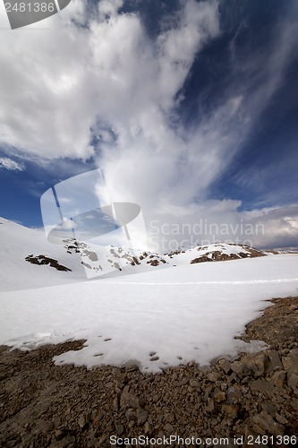 Image of Snowy mountains and sky with clouds