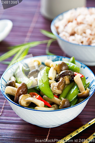 Image of Stirred fried pea with mushroom